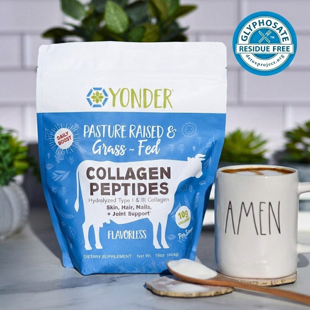 Yonder Grass-Fed Collagen Peptides Flavorless bag beside a coffee mug and a scoop of collagen powder